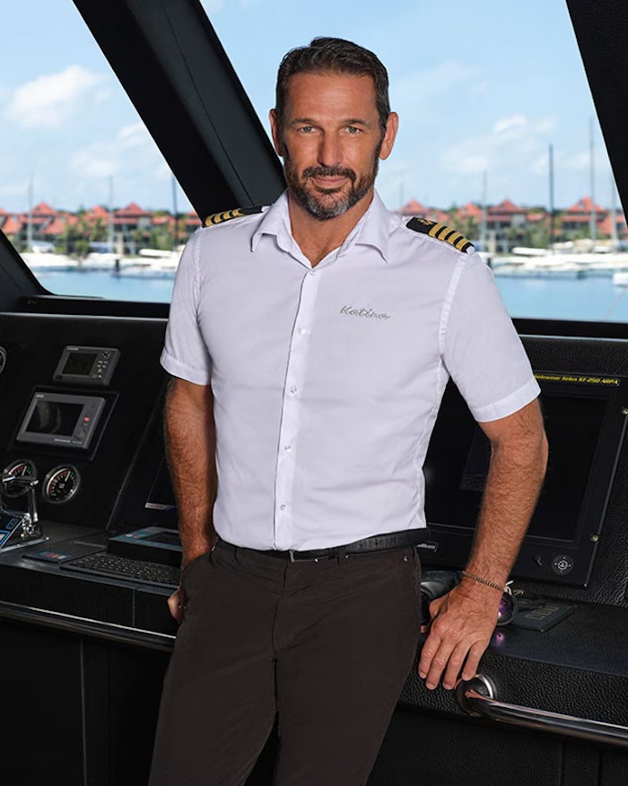 Jason Chambers posing for his promo shot on Below Deck Down Under Season 9.