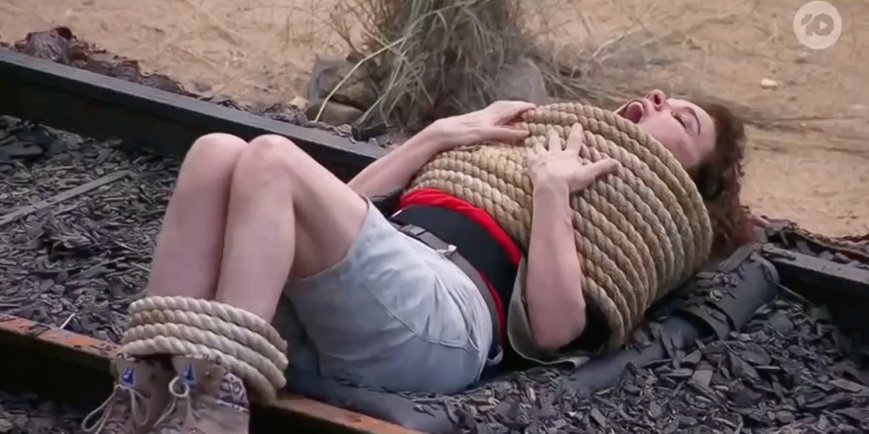 Sigrid Thornton tied up during a challenge on I'm a Celebrity 2025 in an outdoor setting