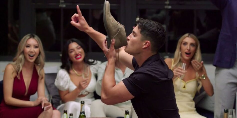 Al Perkins doing a shoey at a MAFS 2022 Dinner Party.