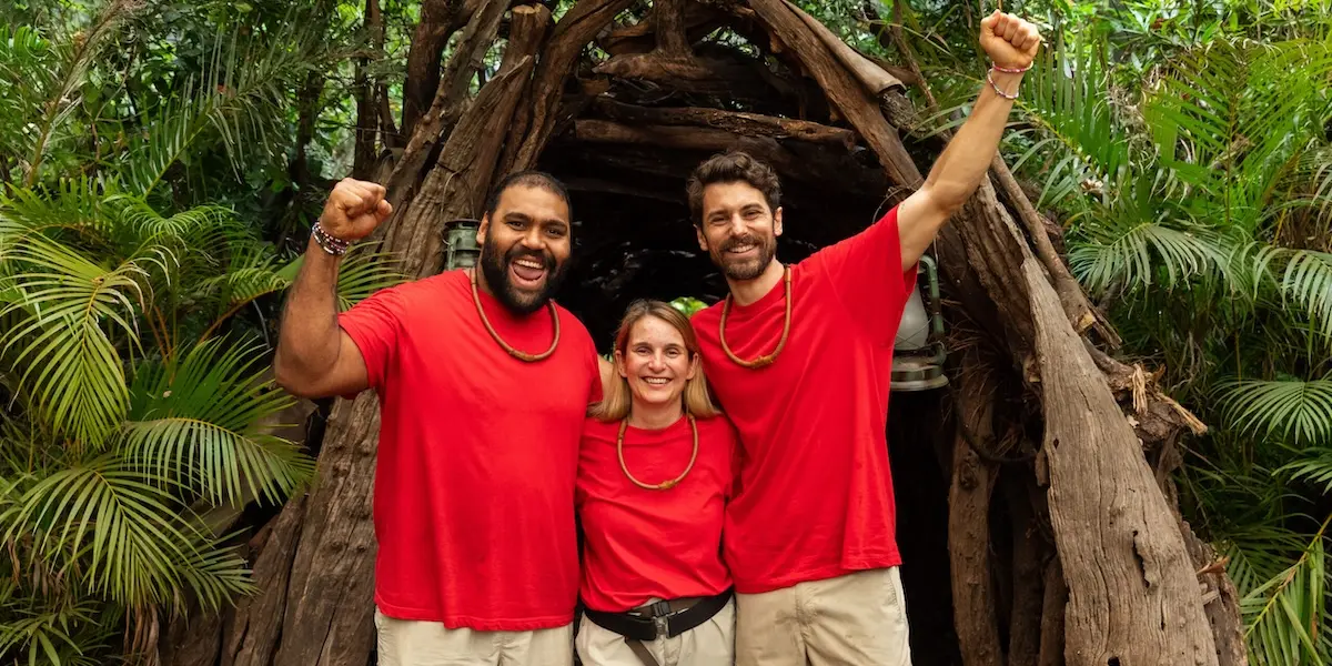 I'm a Celebrity 2025 finalists Matty J, Sam Thaiday and Reggie Bird with their hands up